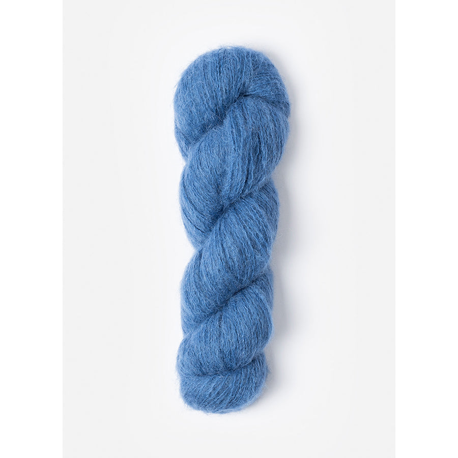 A skein of Blue Sky Fibers Prairie in Aster, a periwinkle blue