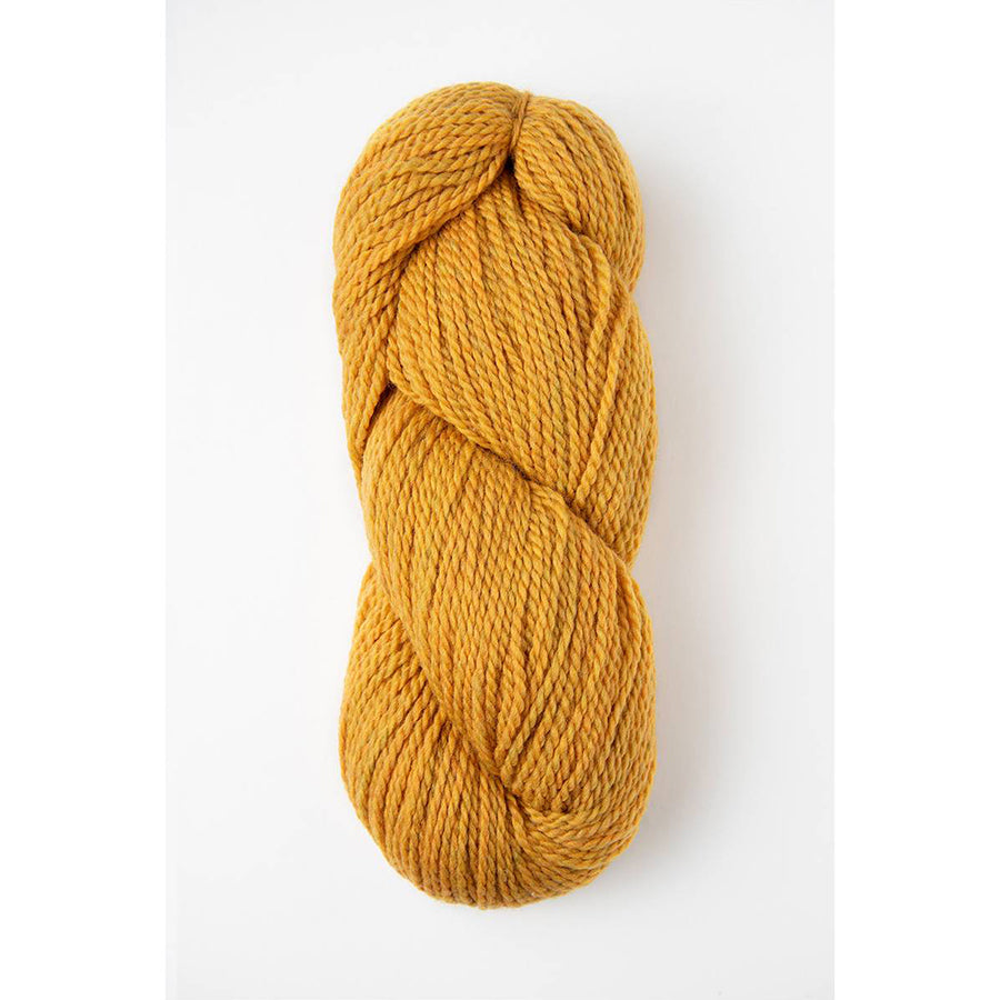 A skein of Amano Riti Golden Sun in golden yellow 