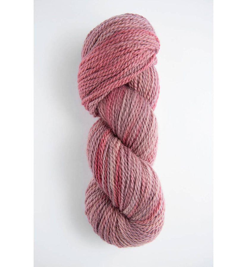 A skein of Amano Riti Gorge in variegated earthy pastel pinks 