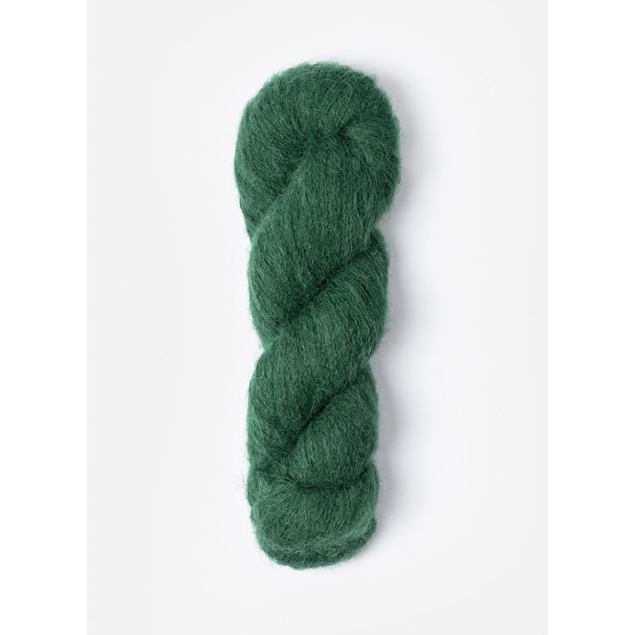 A skein of Blue Sky Fibers Prairie in Hummingbird, a forest green