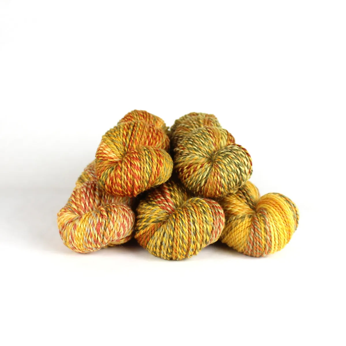 Five skeins of JFM Making Tracks Leaves In The Brook, variegated yellow, orange, red, and green