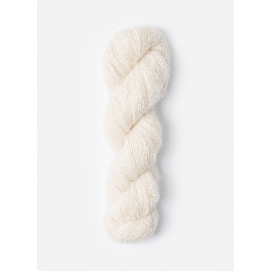 A skein of Blue Sky Fibers Prairie in Yarrow, an off-white