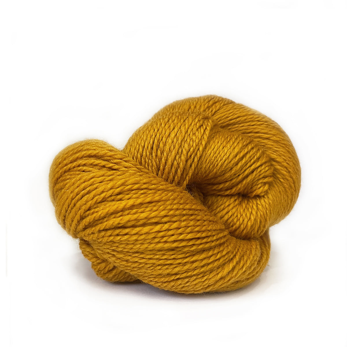 A skein of Kelbourne Woolens Scout Dandelion 720, a golden yellow color