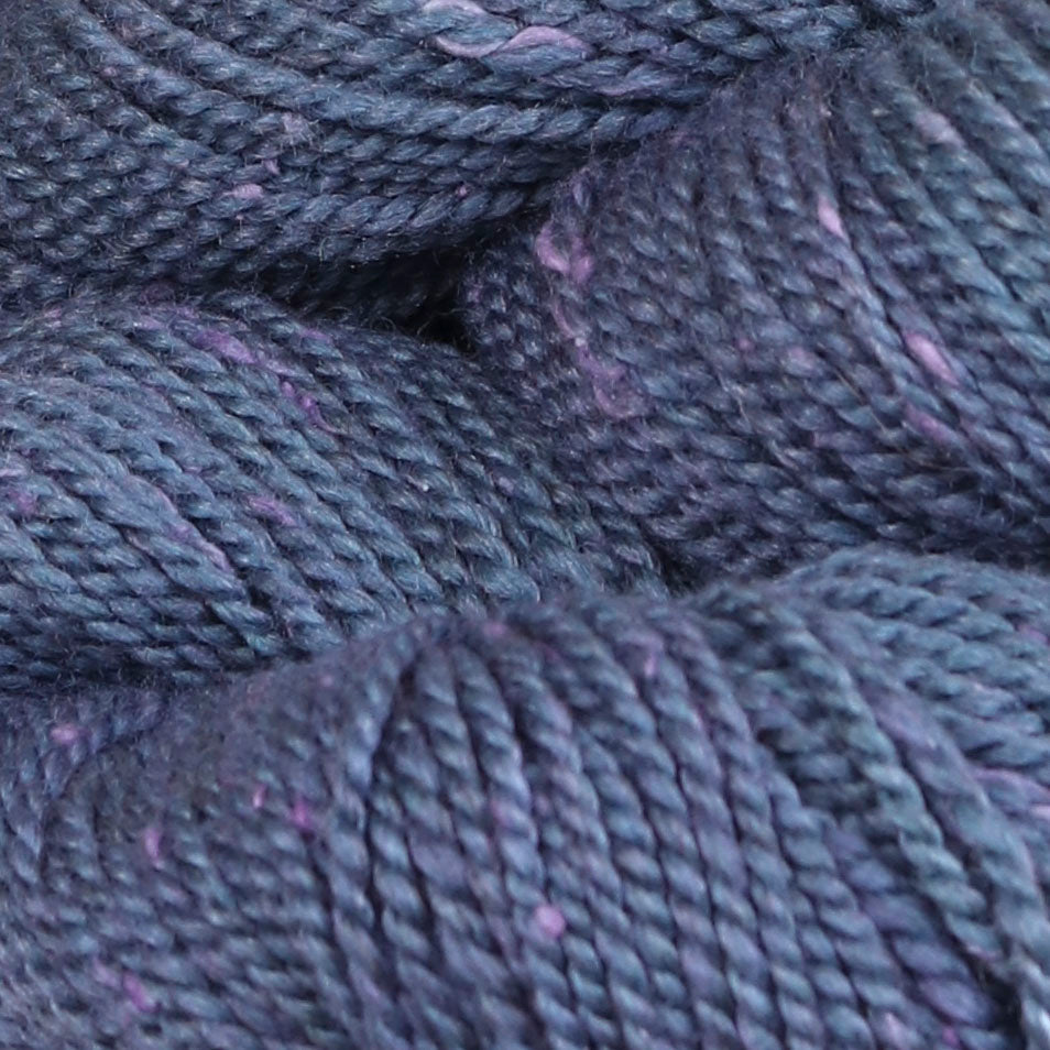 Detail image of The Fibre Co Acadia in Blueberry, a heathered light periwinkle with purple.