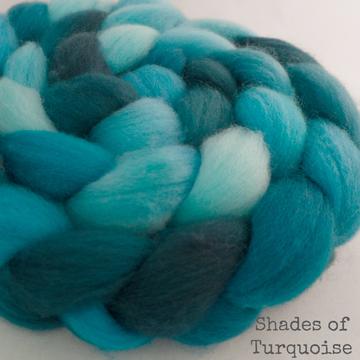 Detail of Greenwood Fiberworks Pigtails Turquoise in a variety of shades of turquoise light to dark.