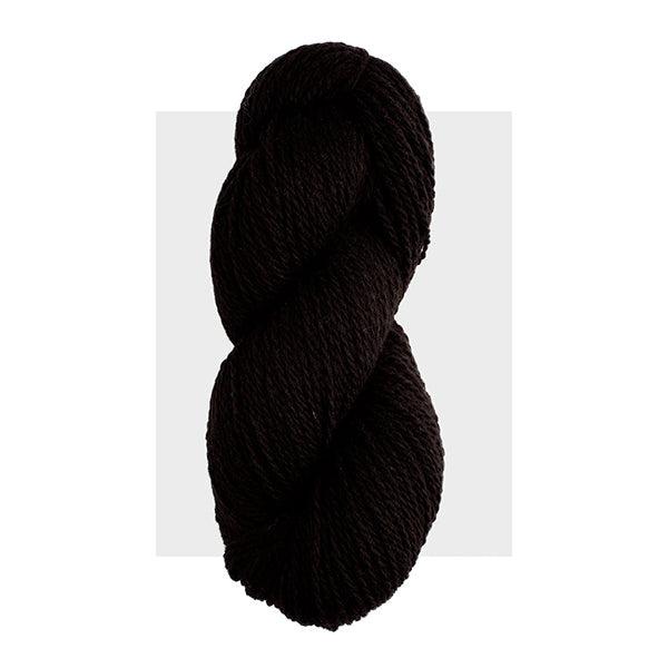 Skein of Harrisville Highland Black, a black yarn.