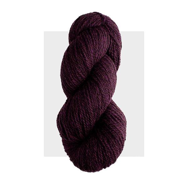 Skein of Harrisville Highland Blackberry, a dark winey purple.