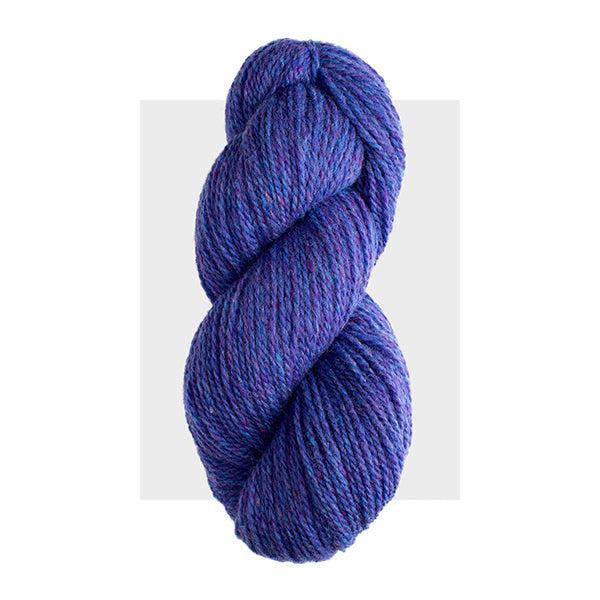 Skein of Harrisville Highland Iris, a dark blue purple heathered with warmer purple.