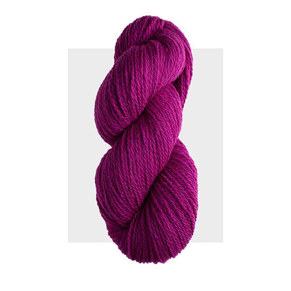 Skein of Harrisville Highland Magenta, a bright magenta.