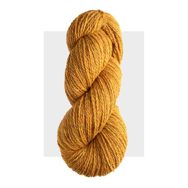 Skein of Harrisville Highland Mustard, a warm yellow with brown tones. 