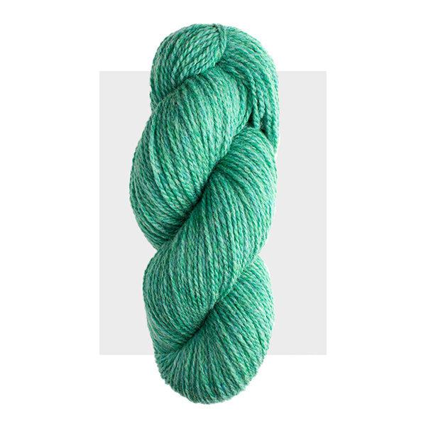 Skein of Harrisville Highland Seagreen, a bright light seafoam green.