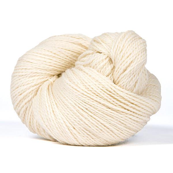 A skein of Kelbourne Woolens Scout Natural 105, an un-dyed natural off white.