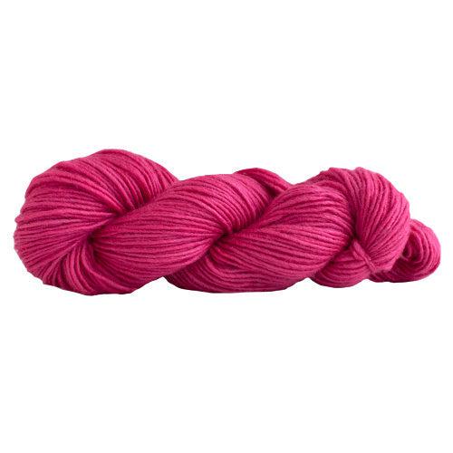 A skein of Manos Silk Blend Cactus Flower 3211, a carnation pink.