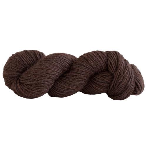 A skein of Manos Silk Blend Coffee 300G, a chocolate brown.